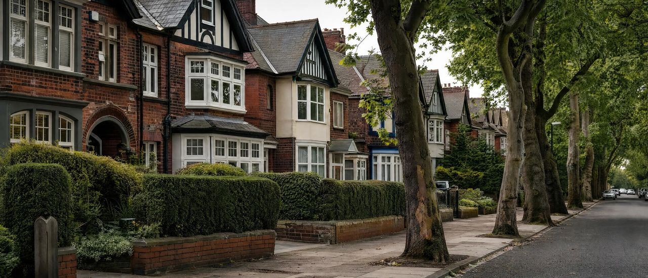 A street of semi-detached houses in northern England in morning light